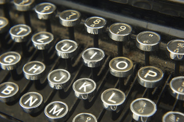 Antique Typewriter. Vintage Typewriter Machine Closeup Photo.