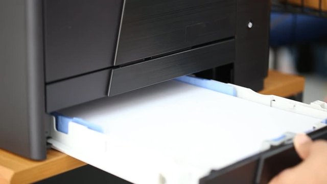Hand insert paper to printer