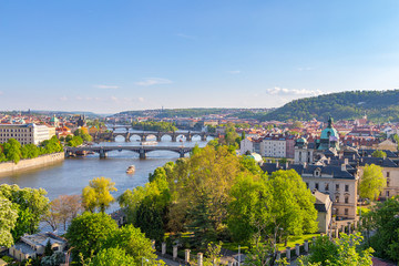 Panorama of Vltava and Charles Bridge from above on sunny day, Czech Republic