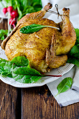 Baked chicken with spices and chard leaves