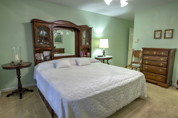 simple bedroom with queen bed