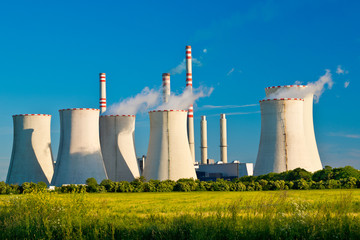 power station with wheat field in summertime