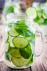 Detox water with cucumber, lime and mint