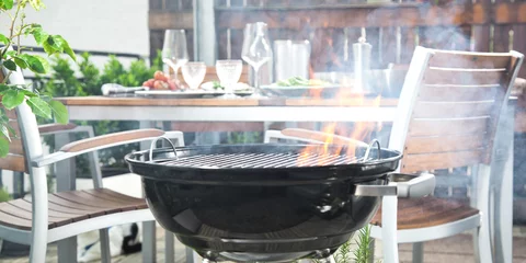 Photo sur Aluminium Grill / Barbecue Grillen auf der Dachterasse 