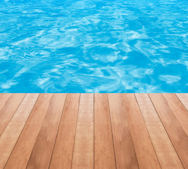 Swimming pool and wooden deck ideal for backgrounds
