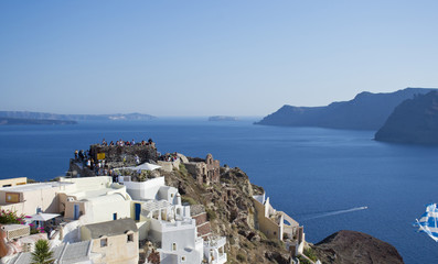 Fototapeta na wymiar Vew of the island of Santorini with buildings and costs