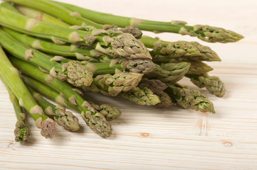 fresh asparagus on a wooden background