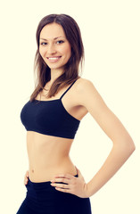 Fototapeta premium Smiling woman in fitness wear