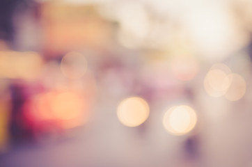 Blur traffic road with bokeh light abstract background.