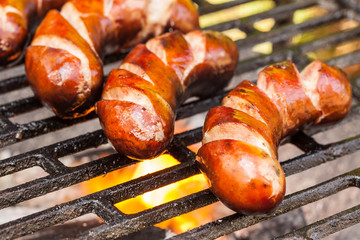 Grilling sausages.