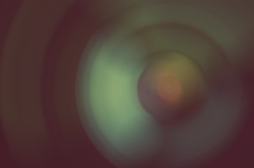 Blur swirl bokeh color light in urban night abstract background.