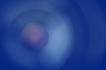 Blur swirl bokeh color light in urban night abstract background.