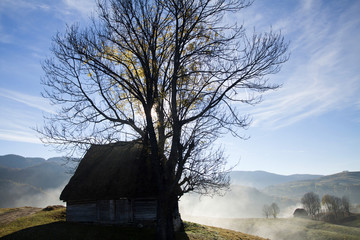 Small cottage in the mountains-panoramic view