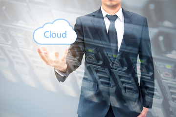 Double expoure of cloud computing concept on hand of a businessm