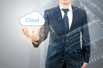 Double expoure of cloud computing concept on hand of a businessm