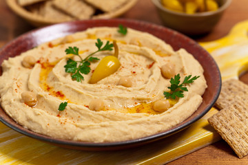 Healthy Homemade Hummus with Olive Oil. Selective focus.