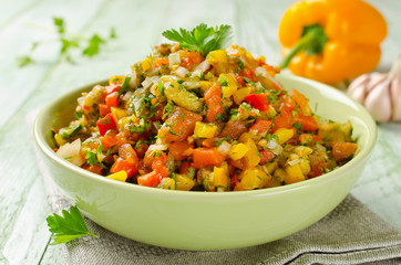 Grilled vegetables salad with yellow and red bell pepper, eggpla