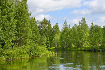 Fototapeta na wymiar Shore of Northern lake. Finnish Lapland