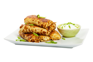 Traditional Russian Fried Stuffed Pancakes Isolated on White. Selective focus.
