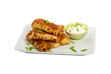 Traditional Russian Fried Stuffed Pancakes Isolated on White. Selective focus.