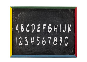 Obraz premium alphabet letters and numbers written on slate board.