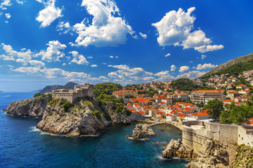 Fototapeta na wymiar Croatia. South Dalmatia. General view of Dubrovnik - Fortresses Lovrijenac (left side) and Bokar seen from south old walls (it is on UNESCO World Heritage List since 1979)