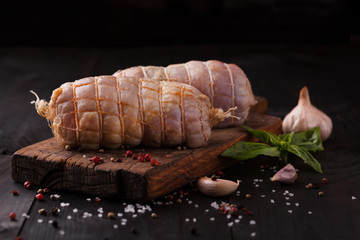 Raw Chicken roll with salt,basil and garlic