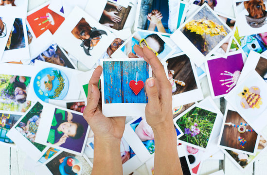 Set of polaroid photos in hands for good memories