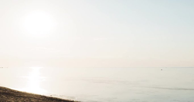 sunset timelapse over fin gulf baltic sea with small clouds and volumetric light, 4k prores footage