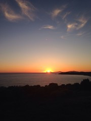 sunset over capo caccia, alghero, sardinia