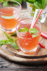 Strong alcohol cocktail with rum and mint