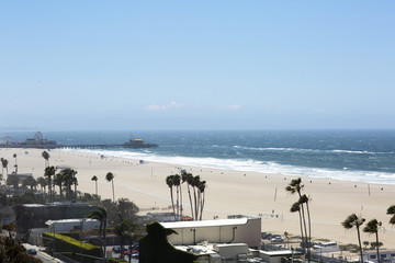 Amusement Park on the Pacific ocean, the beach landscape. The ocean, beach and blue sky in USA, Santa Monica. 