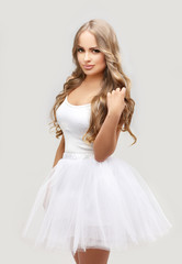 Beautiful blonde   girl wearing white  tutu skirt