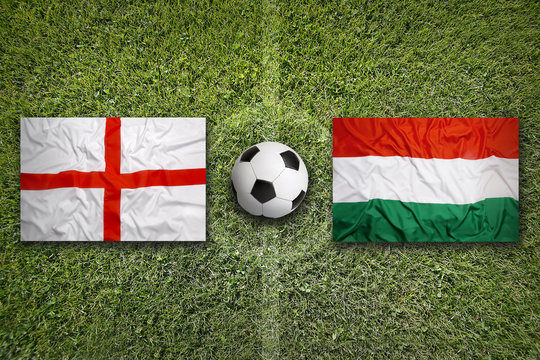 England vs. Hungary flags on soccer field