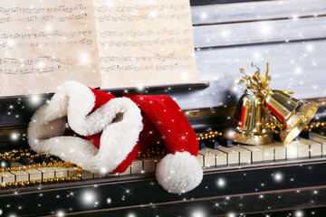 Piano keys decorated and Santa's hat with snow effect
