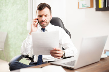Attorney reviewing documents over the phone