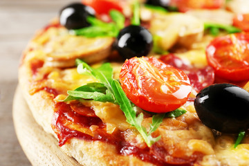 Delicious tasty pizza, closeup