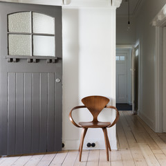 Simple decor of classic wooden chair in apartment entry square