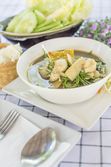 Laos curry  (Thai call Kaeng Nor Mai Sai Biyanang or Kaeng Lao or Tom Prer) baby bamboo pumpkin and mixed vegetable Shoot Soup the traditional delicious Northeastern Style Thai food.