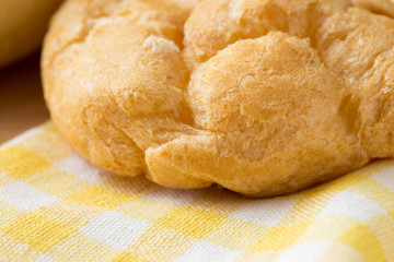 Eclair, France sweet dessert on the table