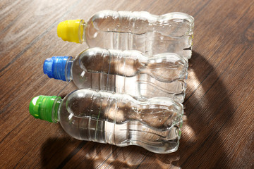 Bottled water on the wooden table,close up