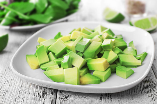 Cubes Of Fresh Avocado On Plate Closeup