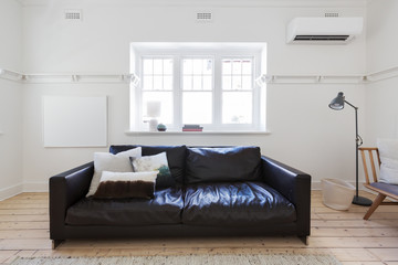 Blank framed art in contemporary interior styled living room