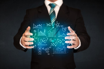 holding hand drawn business diagrams