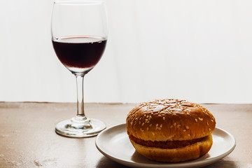 Hamburger and a glass of red wine