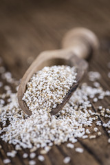 Wooden table with a portion of puffed Amaranth (selective focus)