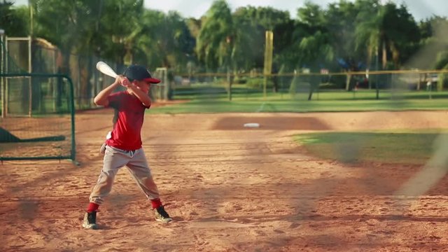 Kid in batting position during baseball practice
