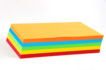 stacking colored papers isolated in white background