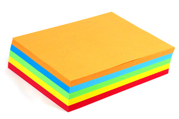 stacking colored papers isolated in white background