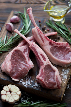 Close-up of raw lamb shoulder rack steaks and seasonings